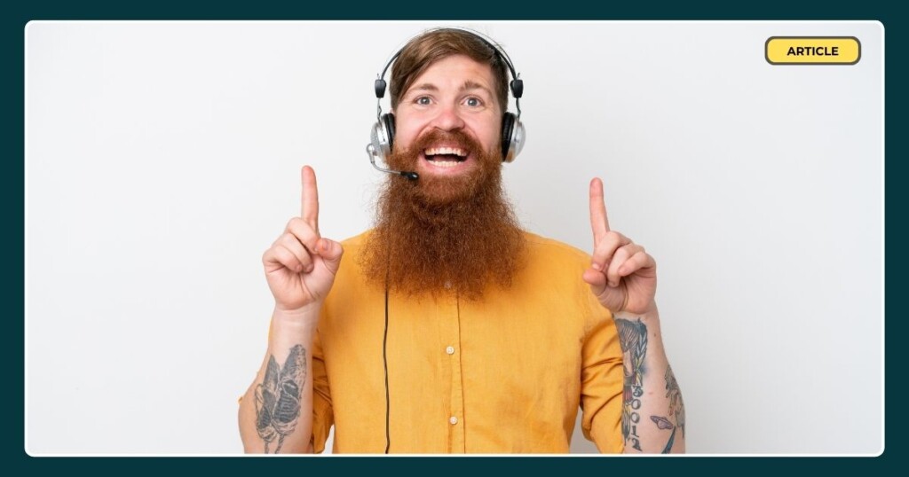 A smiling call agent pointing upwards