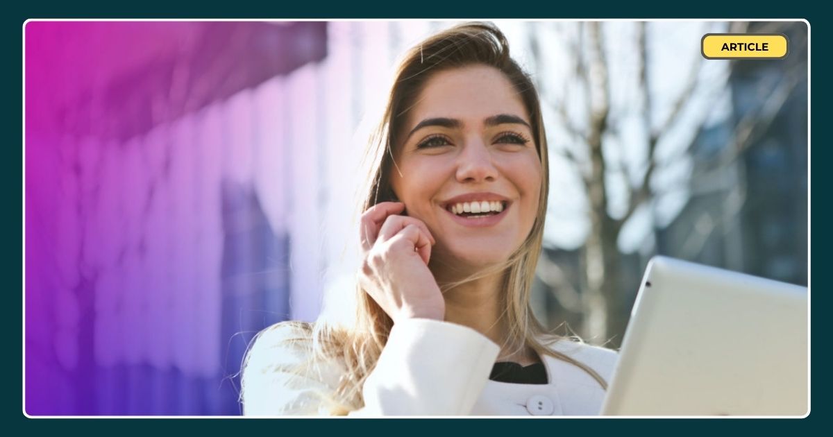 A woman talking to customer service on the phone with her computer open as well to represent omnichannel customer service